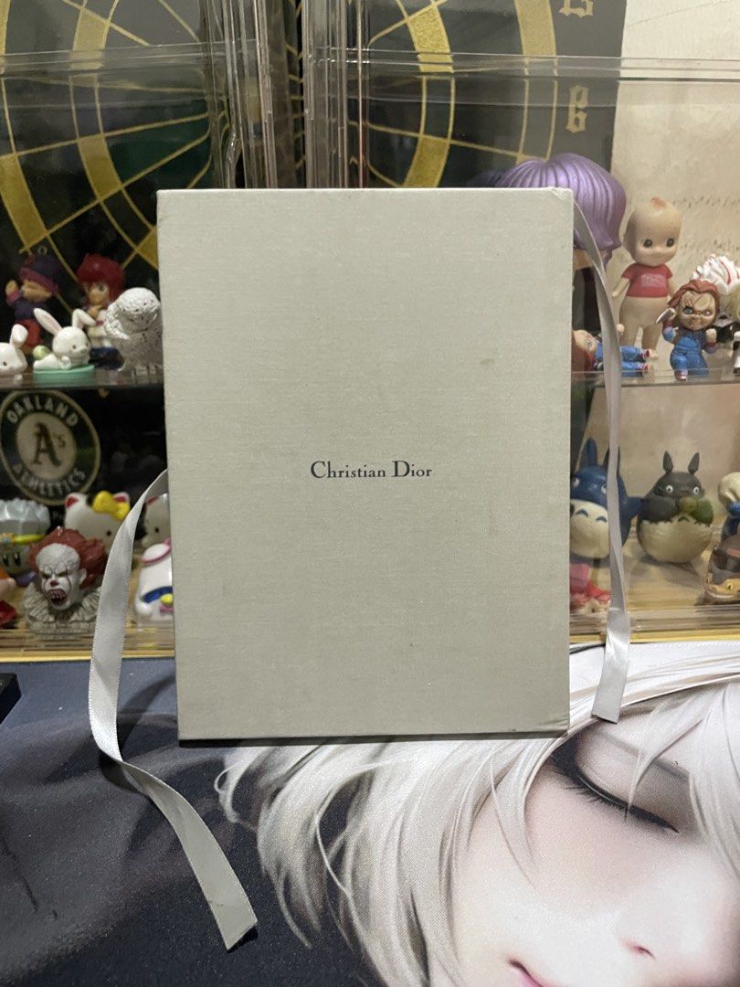 Christian Dior Exclusive Platinum Notebook Diary Journal (Category: Stationery & School Supplies) located in Agdangan. Submitted by kuradekawaii_06 (Listing ID 1465750382, Image 2). Description: CHECK PICTURES - Elegant cloth-bound grey cover with Dior Exclusive Platinum text on the front and Christian Dior on the back - Convenient built-in ribbon bookmark - Clean lined pages inside with a dedicated rose photo insert section - Includes a personal