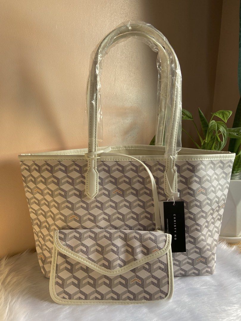 Christy Ng Medium Russo (Category: Tote Bags) located in Manila. Submitted by mysticdolphin.00987e (Listing ID 1465583412, Image 1). Description: Christy ng TopG Medium Russo Available color: -White With paperbag .