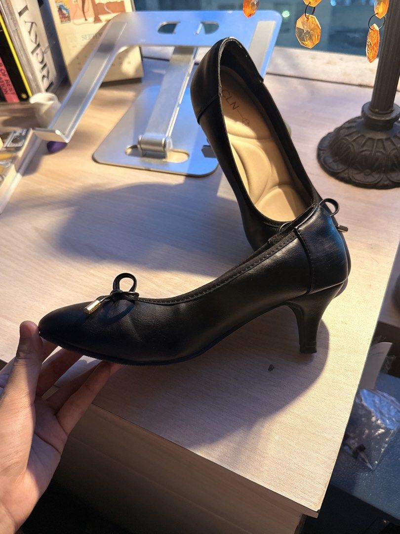 CLN Black Heels — Size 36 (Category: Heels) located in Quezon City. Submitted by am.222 (Listing ID 1465674917, Image 2). Description: still in good condition overall, with some signs of wear and tear. there are scuff marks on the inner side of the shoes and some peeling/lifting around the heel and heel tips, but these aren’t noticeable when worn. original replacement heel tips from CLN are also included. inclusions: - original replacement heel t