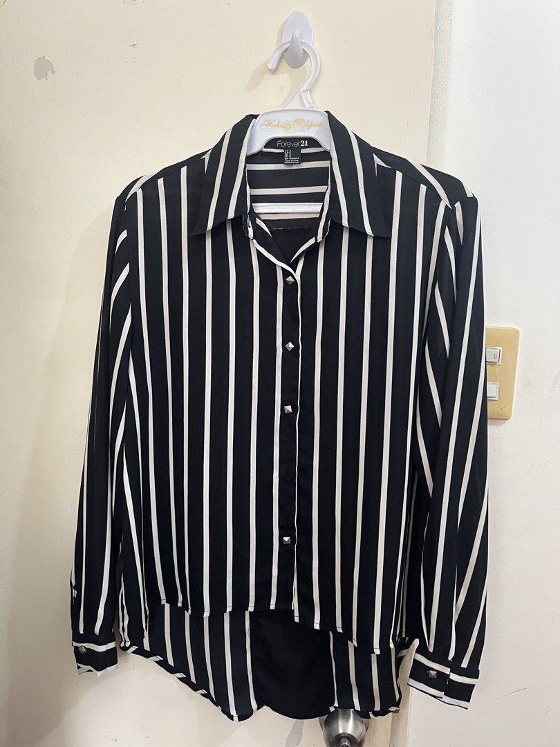 Clothes for 50 pesos each (Category: Blouses) located in Manila. Submitted by alyshop_ (Listing ID 1465636257, Image 1). Description: Tops for only 50 pesos each! Message me if interested!.