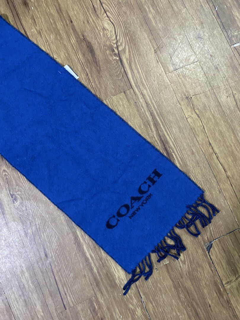 COACH (Category: Undergarments & Loungewear) located in Manila. Submitted by zzztine (Listing ID 1465662345, Image 3). Description: The image shows a Coach Bicolor / Signature Scarf (such as Style Number 76053 or similar wool-cashmere blend muffler) in a navy and blue dual-sided colorway with fringed ends..