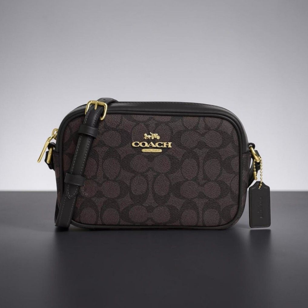 Coach bag: mini jamie (Category: Cross-body Bags) located in Manila. Submitted by kayesellsit (Listing ID 1465680385, Image 1). Description: I have 2 available items. 1 mini jamie blue denim. 1 mini jamie walnut. Coach mini jamie cambag on-hand* Inclusion tag and carecard Guaranteed original for only 6,999 Product details Signature coated canvas and smooth leather Two credit card slots Inside multifunction pocket Zip closure, fabric lining Outsid