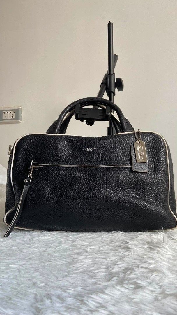 Coach Bleecker Edgepaint Leather Toaster Satchel (Category: Luxury Bags & Wallets) located in Bulacan. Submitted by bella.ken.varietystore (Listing ID 1465733154, Image 1). Description: - Brand: Coach New York - Material: Premium black pebbled leather with contrasting white piping - Hardware: Silver-tone hardware with classic Coach hangtag - Pockets: Front zippered pocket with pull tag - Straps: Double top handles plus an adjustable, detachable t