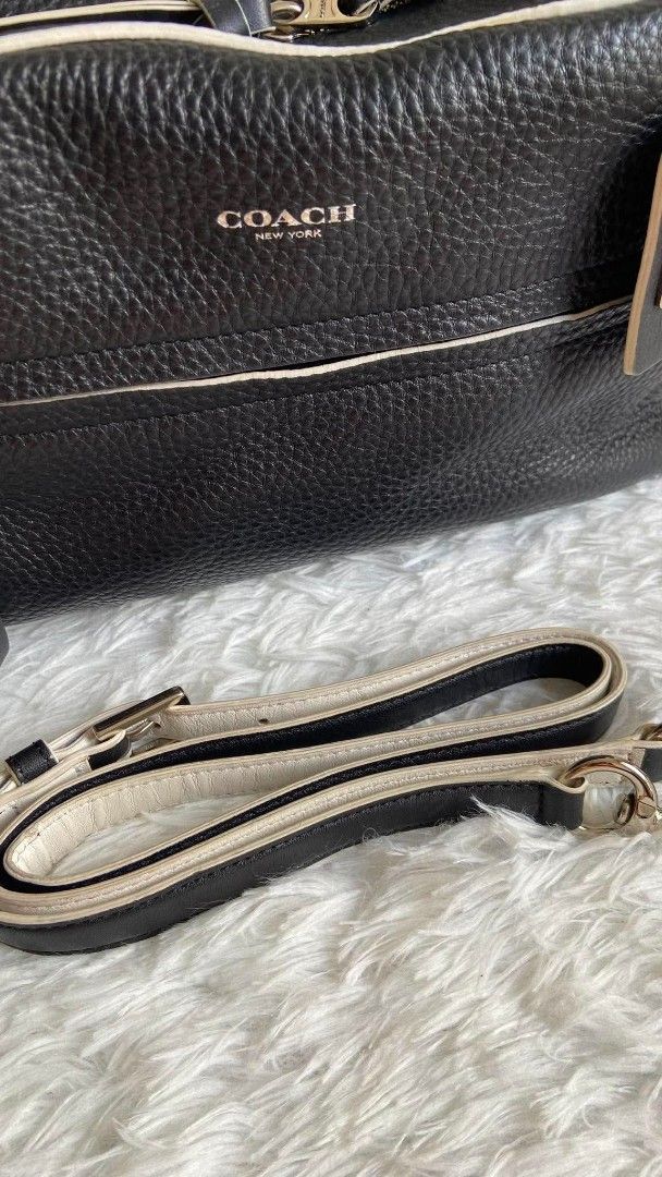 Coach Bleecker Edgepaint Leather Toaster Satchel (Category: Luxury Bags & Wallets) located in Bulacan. Submitted by bella.ken.varietystore (Listing ID 1465733154, Image 2). Description: - Brand: Coach New York - Material: Premium black pebbled leather with contrasting white piping - Hardware: Silver-tone hardware with classic Coach hangtag - Pockets: Front zippered pocket with pull tag - Straps: Double top handles plus an adjustable, detachable t