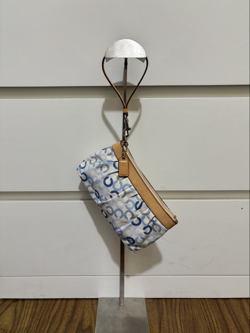 Coach Blue C Op Art Large Wristlet (Category: Shoulder Bags) located in Manila. Submitted by vintage.maem (Listing ID 1465680507, Image 1). Description: CCH Blue C Op Art Large Wristlet Condition: 9.2/10 Rank A Mine: ₱1999 ⚠️ Minimal sign of wear on leather parts.