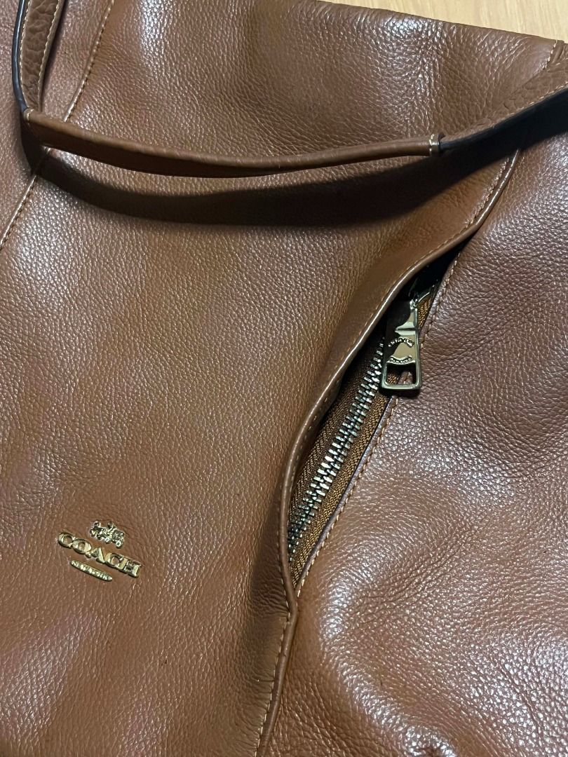Coach Brown Madison Shoulder Bag (Category: Shoulder Bags) located in Manila. Submitted by senggggg. (Listing ID 1465635549, Image 3). Description: good condition as new working zip no hidden issue.