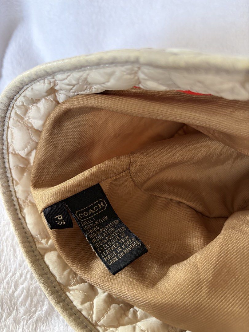 Coach Bucket hat (Category: Hats & Beanies) located in Roxas City. Submitted by rglnos (Listing ID 1465634952, Image 3). Description: coach bucket hat with minimal pink stain on tip of the hat..
