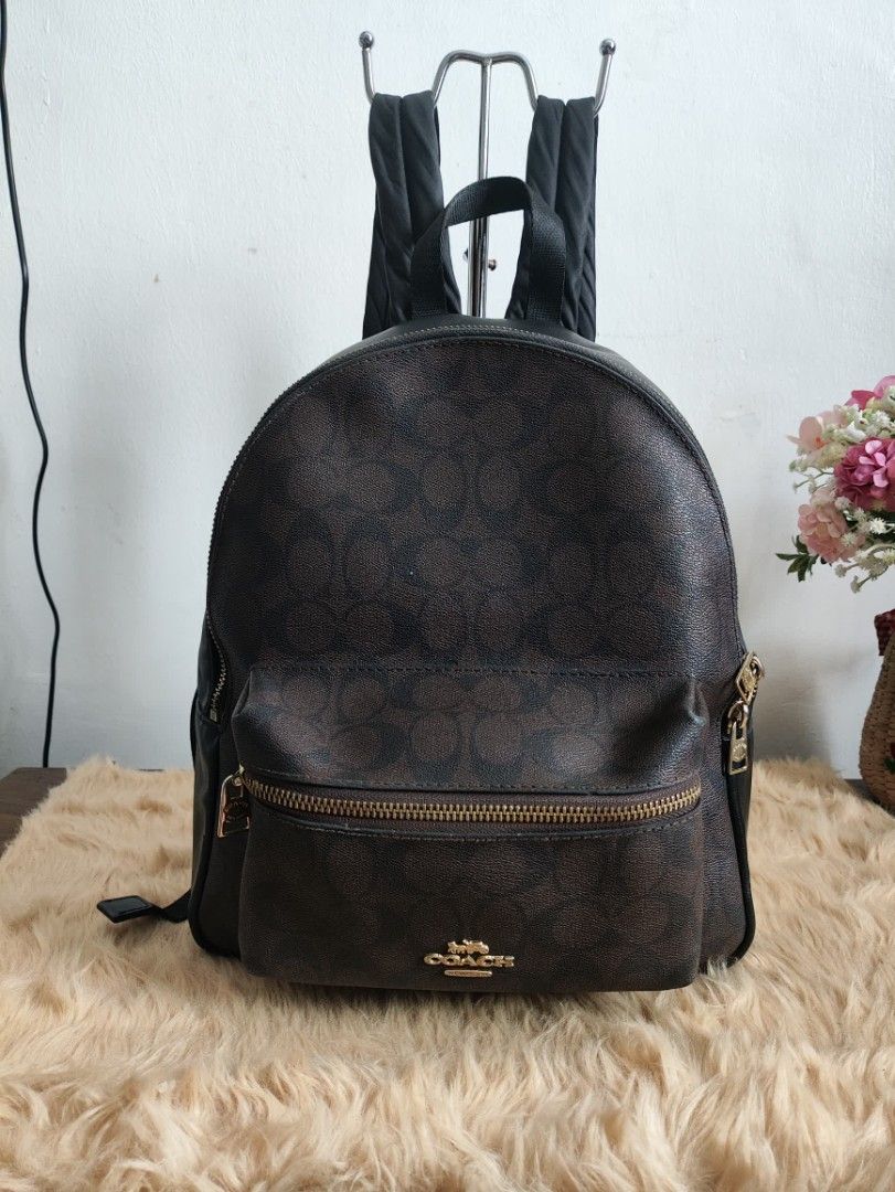 Coach Charlie medium Back Pack (Category: Backpacks) located in Rizal. Submitted by hsiri1128 (Listing ID 1465670230, Image 1). Description: NOT FOR MASELAN 📌Not sure if OG natanggal ung creed nya and my mga tastas sa loob needs tahi CONDITION : 7.5/10 MATERIAL : PVC leather w/ gold hardwares DETAILS : ykk zip Medium size fit ipad and school books. Check pics for details, other issues/flaws.