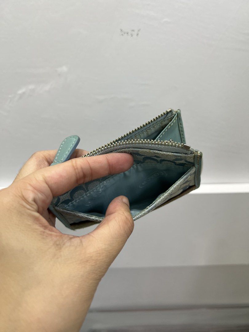 Coach coinpurse (Category: Wallets & Card holders) located in Cabanatuan. Submitted by cristalyngonzales (Listing ID 1465607432, Image 3). Description: signs of used only .