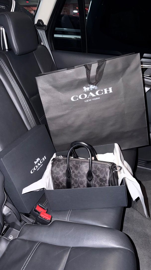 Coach Compass 25 in Signature Canvas (Category: Luxury Bags & Wallets) located in Quezon City. Submitted by jaypeemorales (Listing ID 1465683532, Image 2). Description: Recently bought Coach Compass 25 in Signature Canvas from Coach Rockwell and have not yet used it. Complete with box, paper bag, dust bag and receipt. With 1year warranty on hardware in coach rockwell. Bought it for 23k and selling it for 20k only. RFS: need a bigger bag for my da