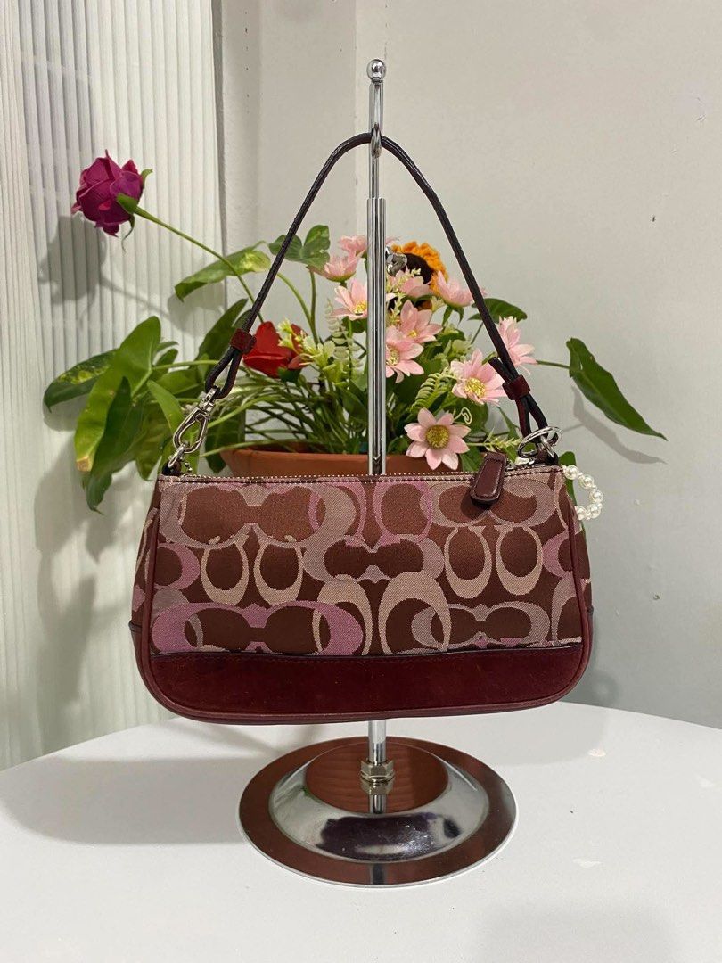 Coach Demi Burgundy Canvas/Suede (Category: Shoulder Bags) located in Cebu City. Submitted by gummybearsworld (Listing ID 1465594612, Image 2). Description: like new theres a little bleed on the handle please see photo can do bundle on my other bags dm me.