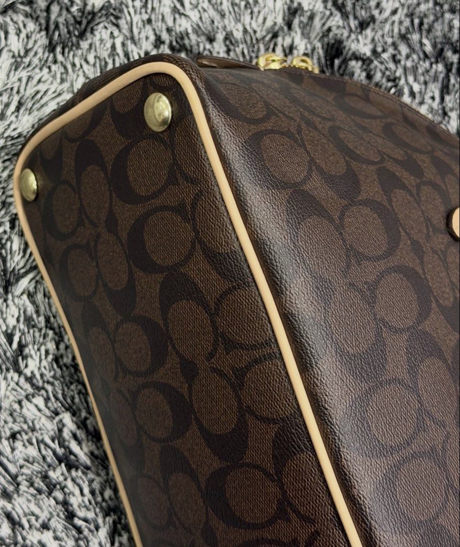 Coach Dome Bag (Category: Luxury Bags & Wallets) located in Quezon City. Submitted by declutteringcloset18 (Listing ID 1465584261, Image 3). Description: Barely used! With cards. No tears/rips. Retails ~20k+ .