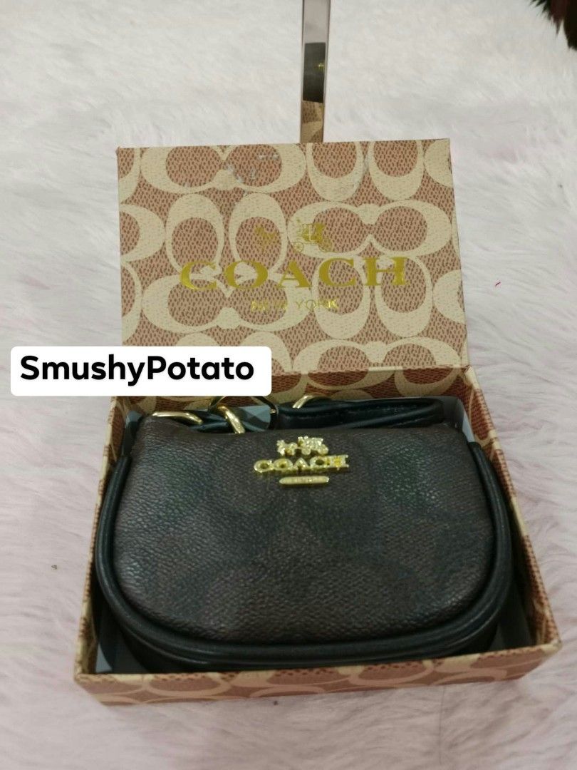 Coach Mini Crossbody Bag presented inside a signature Coach pattern box. (Category: Cross-body Bags) located in Taguig. Submitted by smushypotatoo2.0 (Listing ID 1465716846, Image 2). Description: Available in 4 designs & colors.