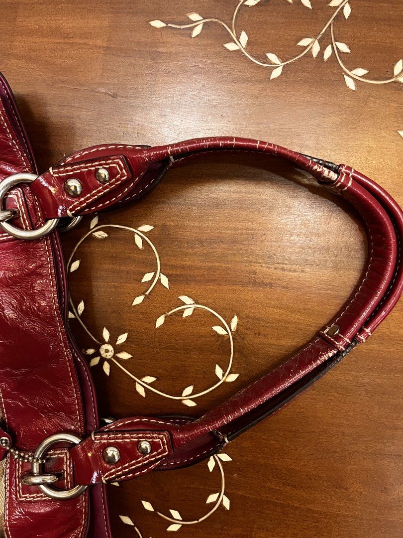 Coach Monogram Leather Tote Bag in Maroon (Category: Luxury Bags & Wallets) located in Manila. Submitted by lalalens._ (Listing ID 1465668667, Image 3). Description: classic brown monogram tote with maroon leather lining. slightly nego + SF !! love, love, love this classic bag. very spacious, handle just needs a little TLC. .