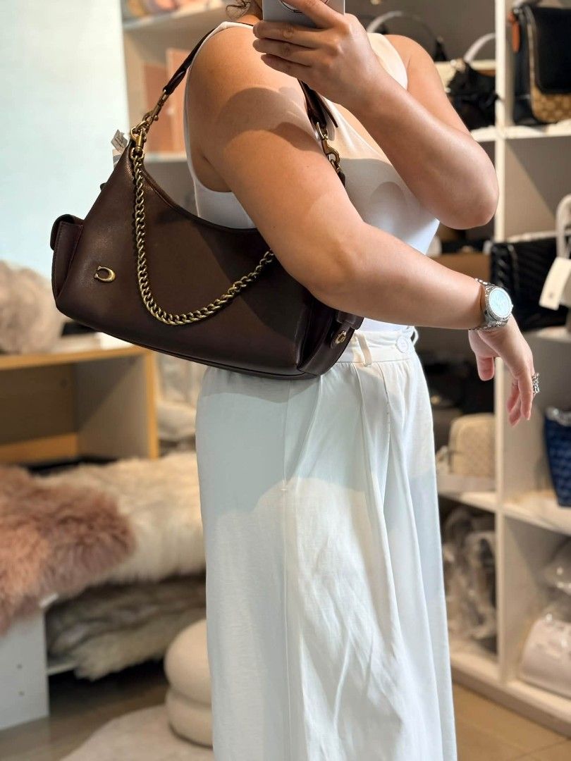 Coach Pocket Juliet 30 (Category: Shoulder Bags) located in Quezon City. Submitted by bagsboutiqueph (Listing ID 1465592310, Image 2). Description: LAST PRICE POSTED. LIMITED STOCKS! BRANDNEW WITH INCLUSIONS. COLOR MAY SLIGHTLY VARY IN ACTUAL DUE TO LIGHTING AND CAMERA SETTING. OTHER PHOTOS WILL BE SEND DURING PURCHASE AND FOR SURE BUYERS ONLY. WHEN IN DOUBT, DO NOT ORDER. THANK YOU..