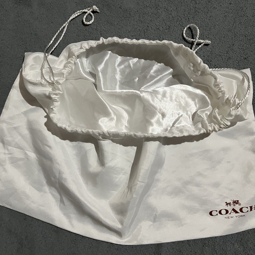 Coach Satin Dust Bag (Category: Luxury Bags & Wallets) located in Hagonoy. Submitted by ianthrift_ph (Listing ID 1465715172, Image 3). Description: (see detailed picture for size) pristine condition no holes issue: minor stain (washable) .