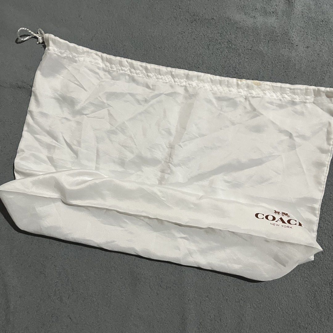 Coach Satin Dust Bag (Category: Luxury Bags & Wallets) located in Hagonoy. Submitted by ianthrift_ph (Listing ID 1465715172, Image 2). Description: (see detailed picture for size) pristine condition no holes issue: minor stain (washable) .