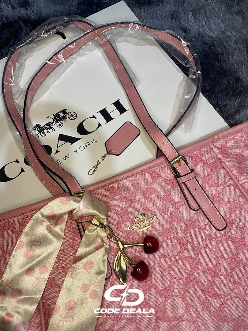 COACH SIGNATURE SHOULDER BAG | PINK (Category: Shoulder Bags) located in Manila. Submitted by codedeala. (Listing ID 1465605261, Image 1). Description: ✨ Brand: Coach 👜 Type: Shoulder Bag 🎀 Color: Pink 🌸 Pattern: Coach Signature Monogram 🍒 Details: Pink leather straps + cherry charm accent 📦Condition: Brand New / Never Used Comes with Coach packaging as shown Perfect for everyday use—spacious, feminine, and easy to pair with different outfit