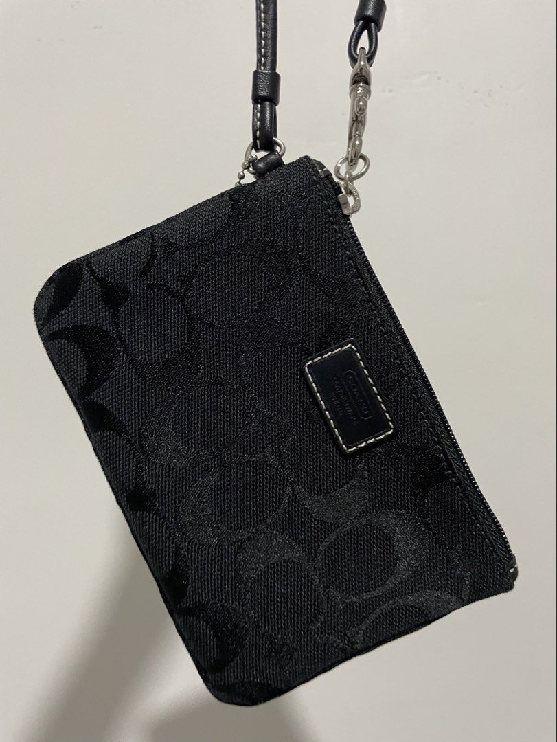 Coach Signature Wristlet (Category: Purses & Pouches) located in Manila. Submitted by ms.cee_ (Listing ID 1465725180, Image 1). Description: Rank S Guaranteed authentic 🇯🇵 Open for VC DM for more photos and inquiries..