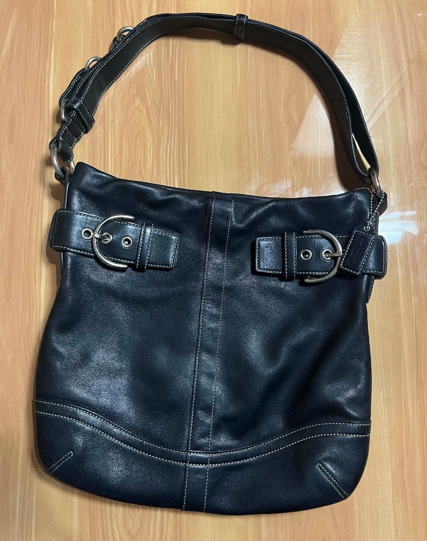 Coach Soho black leather shoulder bag (Category: Shoulder Bags) located in Manila. Submitted by senggggg. (Listing ID 1465636824, Image 2). Description: good condition working zip minimal sign of use no cracks.