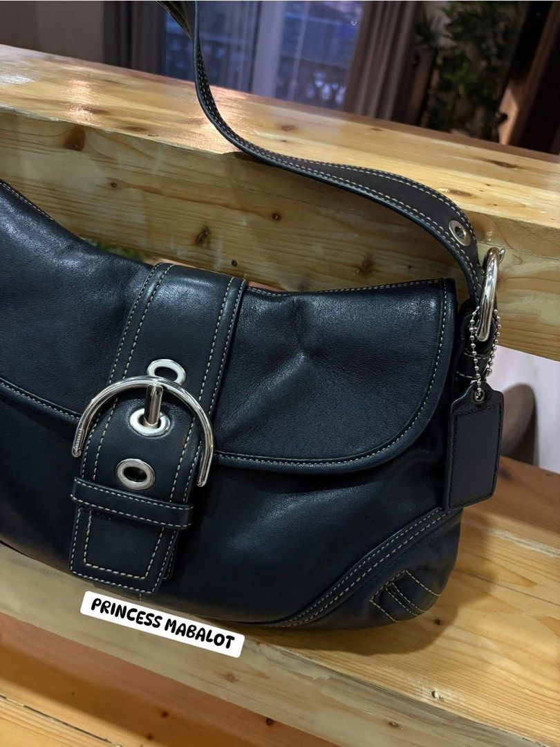 COACH SOHO IN LEATHER BLACK (Category: Luxury Bags & Wallets) located in Baguio. Submitted by thursdaygrind.ph (Listing ID 1465597590, Image 3). Description: WITH MINIMAL SIGN OF USE; SCRATCHES BUT NOT NOTICEABLE NO ISSUE ON RUBBER LININGS.