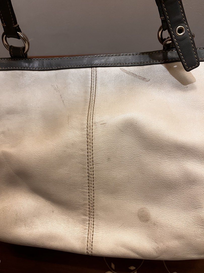 Coach White and Blue Leather Tote Bag (Category: Luxury Bags & Wallets) located in Manila. Submitted by lalalens._ (Listing ID 1465670749, Image 3). Description: coach white leather tote bag, with flaws! kindly check pics for the conditions. slightly nego + SF spacious light purple interior, with turn-lock side pockets. good condition of the handles, leather body just has stains .