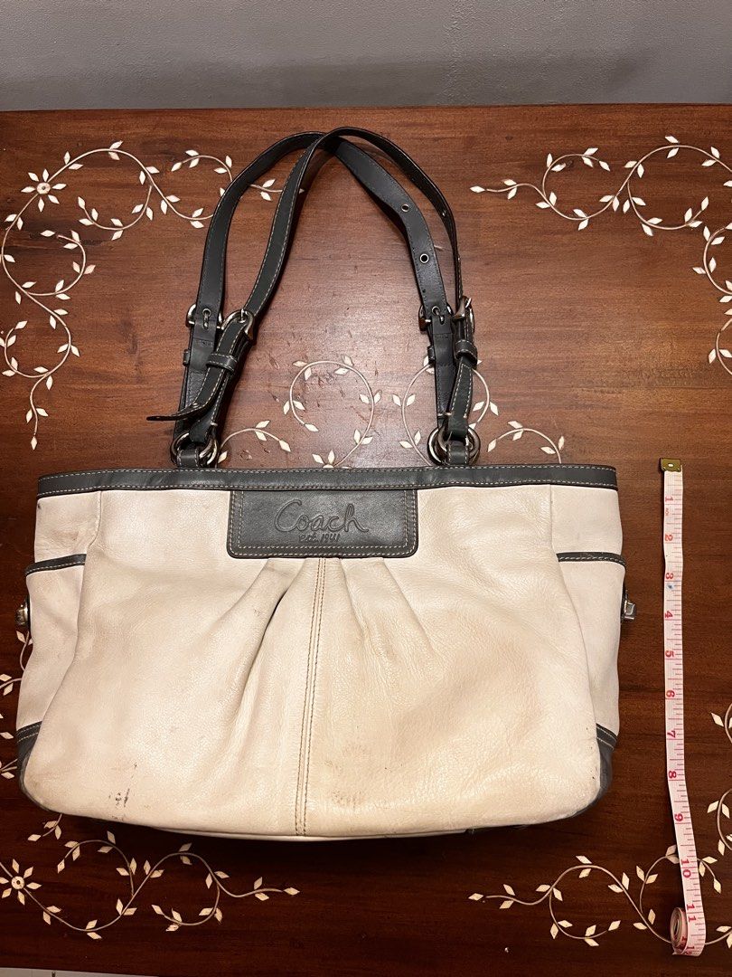 Coach White and Blue Leather Tote Bag (Category: Luxury Bags & Wallets) located in Manila. Submitted by lalalens._ (Listing ID 1465670749, Image 1). Description: coach white leather tote bag, with flaws! kindly check pics for the conditions. slightly nego + SF spacious light purple interior, with turn-lock side pockets. good condition of the handles, leather body just has stains .