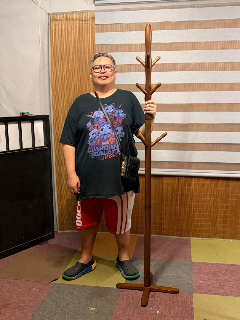Coat Rack (Category: Other Home Furniture) located in Meycauayan. Submitted by marygracecasimiro (Listing ID 1465622242, Image 2). Description: Freestanding SOLID WOOD Coat Rack COLLAPSIBLE!!! HEAVY-DUTY!!! PWEDENG PWEDE SA RIDER!!! *SEE VIDEO COMMENT Price : 2,500 ✅ Height : 71 inches, 5'11" Almost 6 feet In VERY good condition 💛💛.