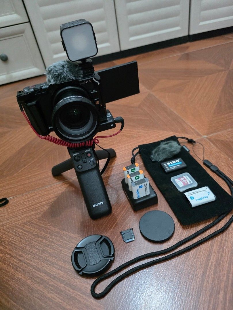 (COMBO) SONY ZV-1 Set & RODE Wireless GO II (Category: Cameras) located in Manila. Submitted by everyallmustgo (Listing ID 1465745083, Image 1). Description: Sony ZV-1 SmallRig ZV-1 cage Sony shooting grip RØDE Wireless GO II RØDE furry windshields 5 Extra batteries Battery charger & Cables 64GB SD card Lense Small Light.