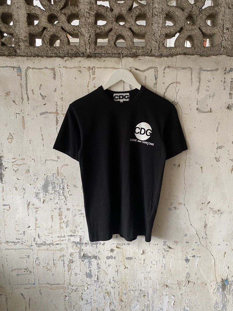 Comme des Garcons - Circular Logo Tee (Category: Tshirts & Polo Shirts ) located in Puerto Princesa. Submitted by something___. (Listing ID 1465670598, Image 1). Description: Comme des Garcons - Circular Logo Tee Tagged Size: Small (Dimension) Length: 25 Width: 18 Condition: Excellent Color rate: 9.7 Flaws: None.