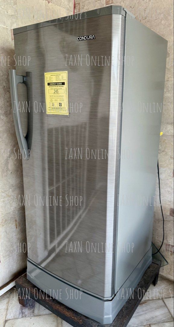 Condura CSD210SA-G2 Single Door Refrigerator (Category: Refrigerators and Freezers) located in Santa Cruz. Submitted by za2011za (Listing ID 1465581697, Image 2). Description: - Brand/Model: Condura CSD210SA-G2 - Type: Single door refrigerator - Finish: Stainless steel with grey handle and base - Capacity: 173 liters total storage volume - Power: 230V, 60Hz (Energy efficient factor: 245) - Condition: Clean, energy guide sticker still attached - P