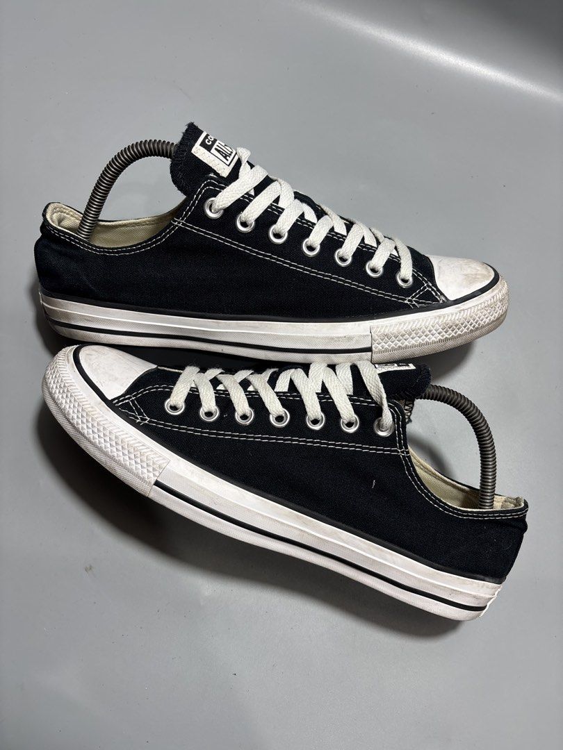 Converse All Star Low Black Size 9 US (Category: Sneakers) located in Butuan. Submitted by shoeetasho (Listing ID 1465757479, Image 2). Description: - Brand: Converse - Style: Classic All Star low top - Color: Black with white laces and rubber toe cap - Size: 9 US / 42.5 EUR / 27.5 cm - Condition: Great everyday pair with standard signs of wear on soles and siding - Perks: Free shipping included!.