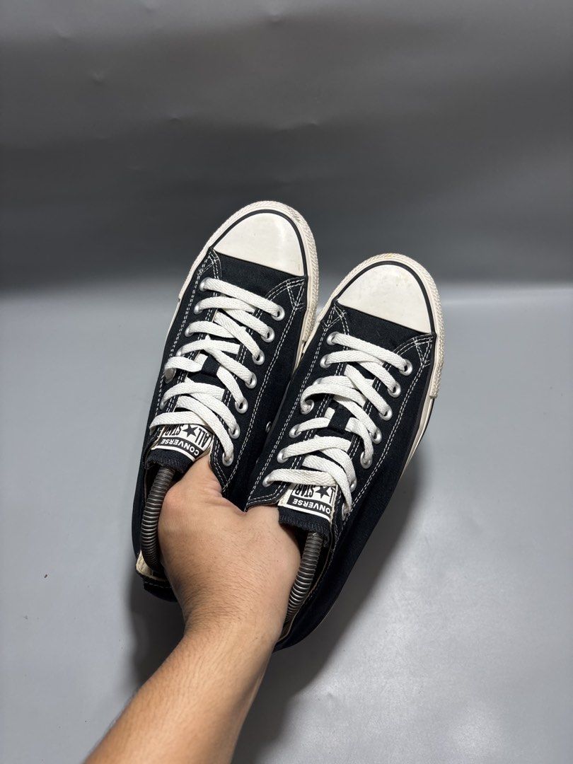 Converse Chuck Taylor All Star Black Low Top (Category: Sneakers) located in Butuan. Submitted by shoeetasho (Listing ID 1465757353, Image 2). Description: - Item: Classic Black Low Top Converse Sneakers - Size: US Men's 8.5 / US Women's 10.5 / UK 8.5 / EUR 42 (27cm) - Condition: Clean canvas upper with minimal wear on the soles - Color: Black with white rubber sole and laces - Style: Timeless, casual, and easy to pair with any outfit.