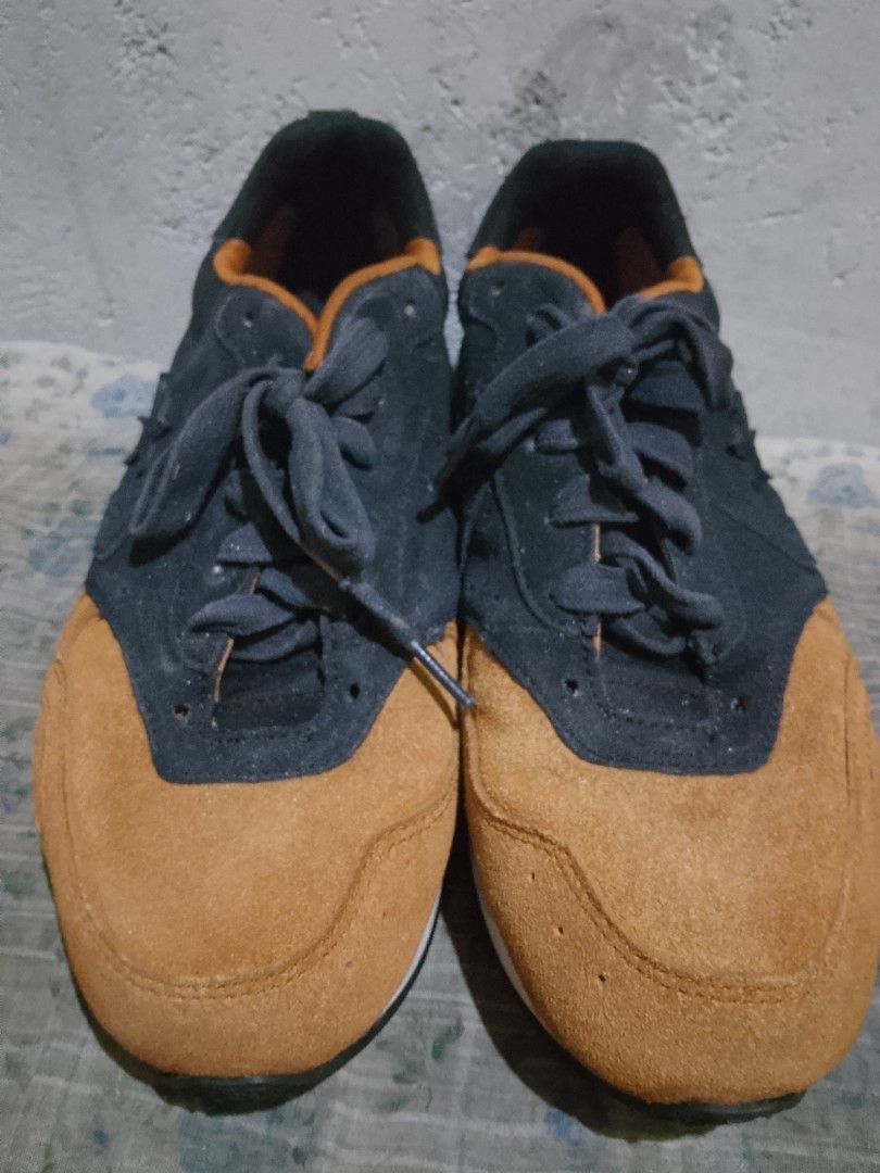 Converse Malden Racer Sneaker (Category: Dress Shoes) located in Manila. Submitted by wildwater26 (Listing ID 1465644390, Image 2). Description: - Brand: Converse low top sneakers - Material: Premium black and mustard brown suede upper - Design details: Contrasting orange collar lining, classic side star logo, and dark grey laces - Sole: Durable white midsole with dark outsole - Fit & Style: Comfortable everyday wear with a sleek runner-inspired 