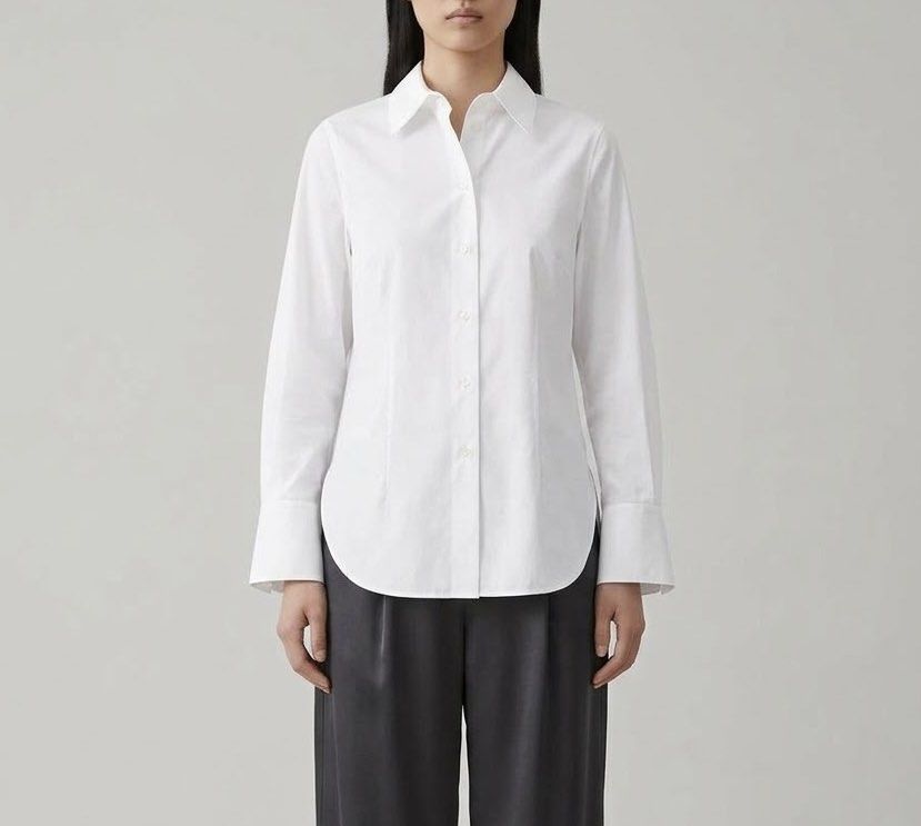 COS White Button-Up Tailored Polo Longsleeve (Category: Shirts) located in Caloocan City. Submitted by declutteringph. (Listing ID 1465697374, Image 1). Description: Size EUR32 on the tag! Measurements: Dimensions: (inches) Shoulder Width: 16” Bust Width: 18” Body Length: 27” | Back: 30 1/2” Sleeves Length: 22”.