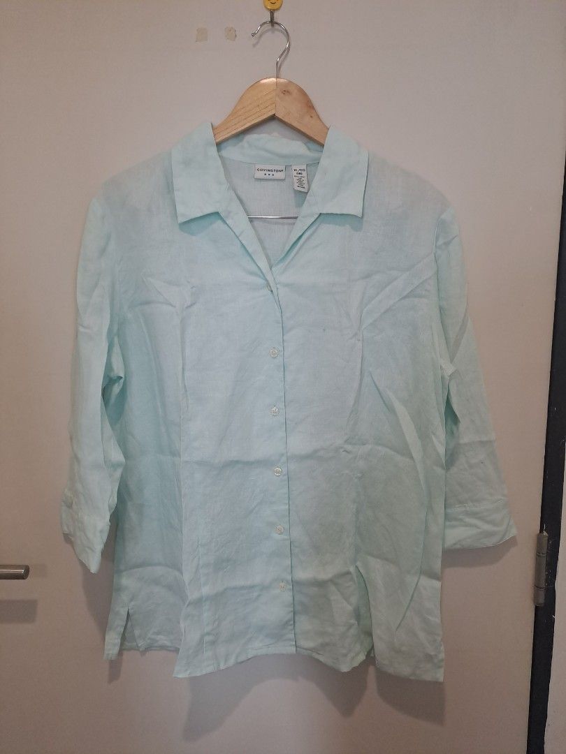COVINGTON 100% LINEN (Category: Longsleeves) located in Manila. Submitted by joanbalde39643 (Listing ID 1465605208, Image 1). Description: The image features a mint green, light pastel-colored linen button-up shirt featuring a wide spread collar, button-front closures, and relaxed 3/4 sleeves..