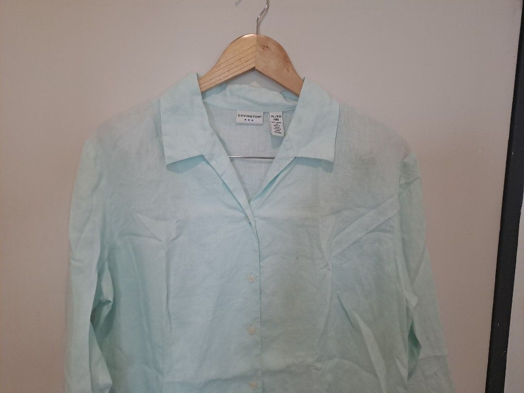 COVINGTON 100% LINEN (Category: Longsleeves) located in Manila. Submitted by joanbalde39643 (Listing ID 1465605208, Image 2). Description: The image features a mint green, light pastel-colored linen button-up shirt featuring a wide spread collar, button-front closures, and relaxed 3/4 sleeves..