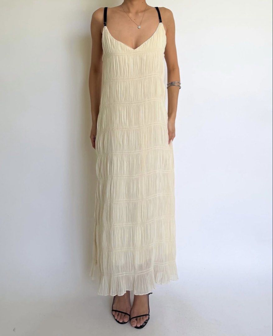 Cream pleated long maxi dress (Category: Dresses) located in Paranaque City. Submitted by mary_jj (Listing ID 1465656332, Image 1). Description: Very comfy and has hq pleats. Purchased for 1800.