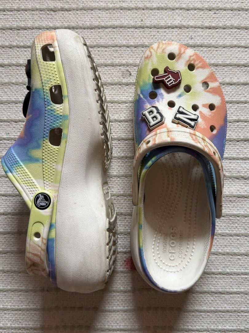 ORIGINAL Crocs Tie Dye Platform Clogs With Jibbitz (Category: Slippers and slides) located in Mandaluyong City. Submitted by knb.ph (Listing ID 1465621554, Image 2). Description: - ORIGINAL Crocs - No Box - Style: Tie-Dye Platform Clog - Size: Women's US 9 - Free Jibbitz charms included (smiley face, wine glass, sushi, and letter charms) RFS: Decluttering.