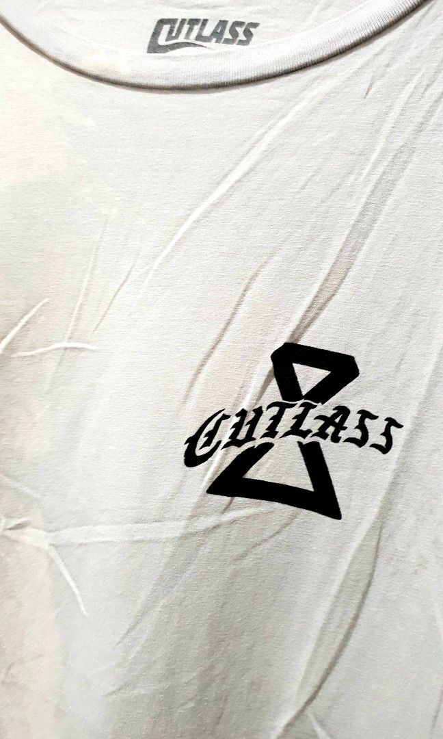Cutlass (Category: Tshirts & Polo Shirts ) located in Taguig. Submitted by thriftedminds (Listing ID 1465730172, Image 3). Description: Item: Cutlass🔥 ‎Size: OPT Cutlass (L) ‎Width: 22.5 ‎Length: 29 ‎Condition: Good ‎Issue: White stain pero parang tie dye, Need Wash DM to purchase 📩.
