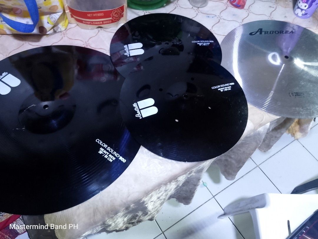 Cymbals set (Category: Musical Instruments) located in Cavite. Submitted by paul_nilayan (Listing ID 1465627195, Image 1). Description: - Complete cymbal bundle featuring beatello Color Sound 900 in deep black with white text - 20-inch heavy ride cymbal included - 14-inch heavy -hat pair included - Bonus: 1 silver Arborea cymbal included - Delivers heavy projection with a striking, dark aesthetic - Condition: Good setup for drummers wanting a vis
