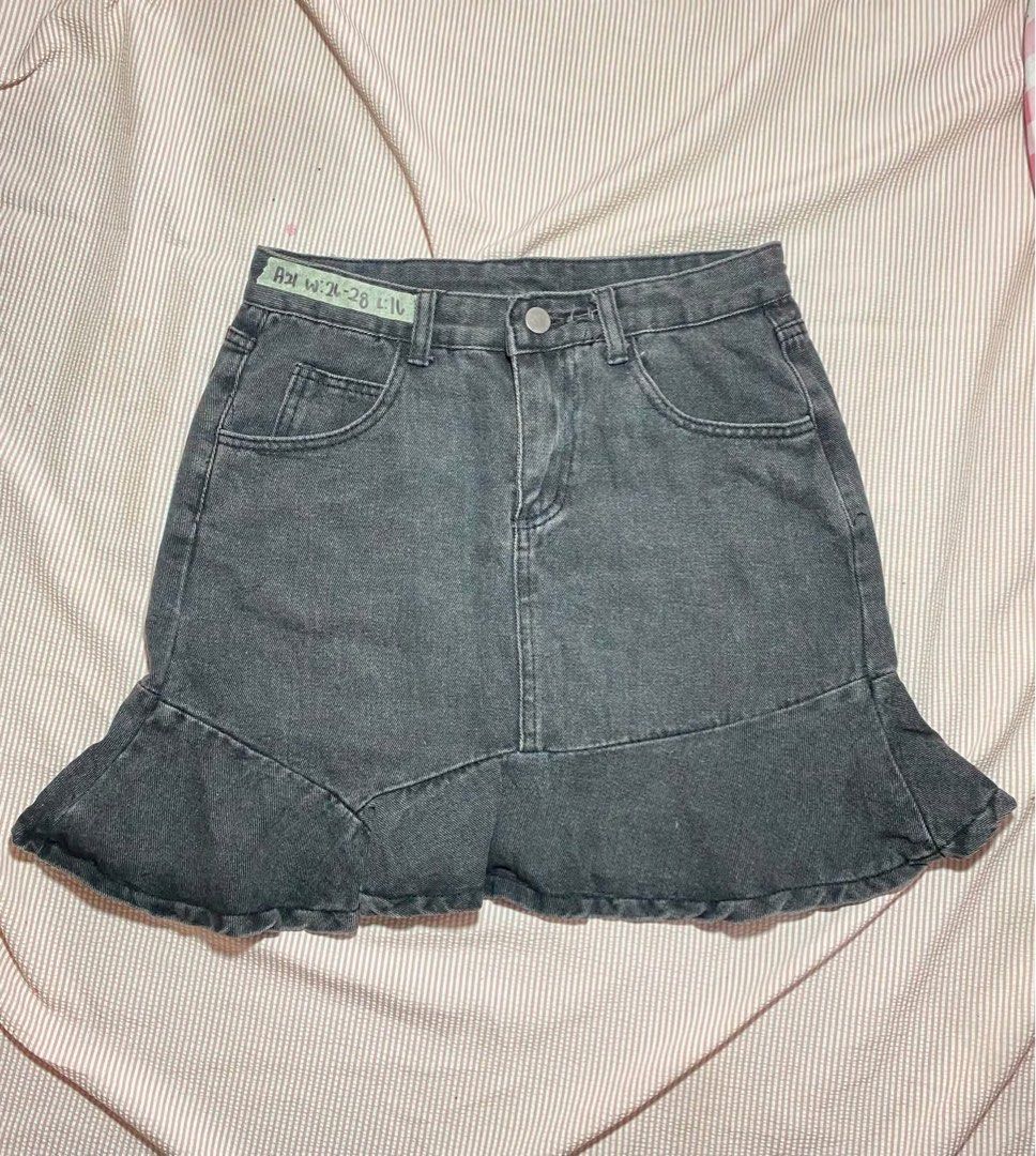 Dark Grey Denim Ruffle Skirt (Category: Skirts) located in Manila. Submitted by lucky_jinky (Listing ID 1465629971, Image 1). Description: W:26-28 L:16 - Color/Wash: Dark grey denim - Design: Flared hem with front and back pockets - Closure: Front button and zip - Size: Fits waist 26 to 28 inches - Style: Casual and easy to match with tees or knit tops.