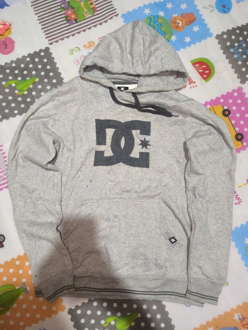 DC pull over Hoodie (Category: Activewear) located in Davao. Submitted by gabriieeel (Listing ID 1465587450, Image 1). Description: this is DC grey pull over hoodie with center print logo good as new need wash do vc on blue app for safe transaction.