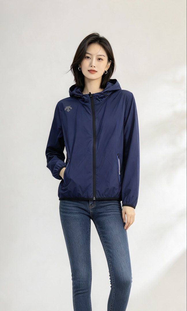 DESCENTE Hooded Windbreaker Jacket Blue (Category: Coats, Jackets and Outerwear) located in Paranaque City. Submitted by preluxeshop_ph (Listing ID 1465555030, Image 1). Description: DESCENTE Hooded Windbreaker Jacket Blue - Color: Blue - Style: Lightweight windbreaker jacket with full zip and attached hood - Pockets: Two secure zippered hand pockets - Details: Elastic cuffs and hem for a snug fit - Size: Women’s M (US 6, IT 46) - Condition: Clea