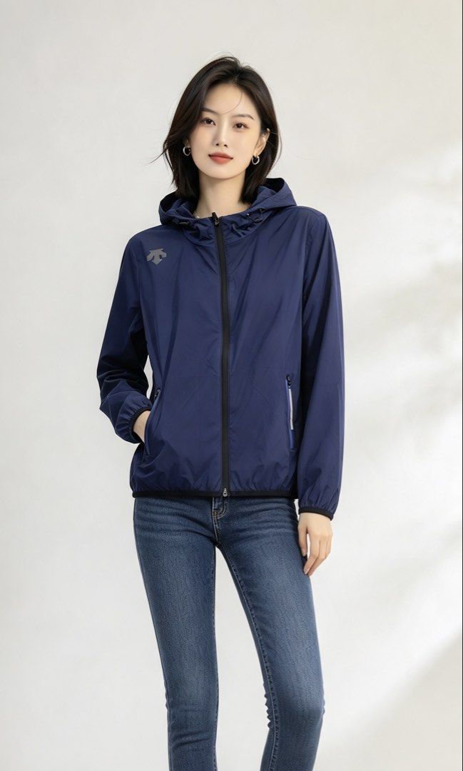 DESCENTE Hooded Windbreaker Jacket Blue (Category: Coats, Jackets and Outerwear) located in Paranaque City. Submitted by mykapoynton (Listing ID 1465544667, Image 1). Description: DESCENTE Hooded Windbreaker Jacket Blue - Color: Blue - Style: Lightweight windbreaker jacket with full zip and attached hood - Pockets: Two secure zippered hand pockets - Details: Elastic cuffs and hem for a snug fit - Size: Women's M (US 6, IT 46) - Condition: Clean i