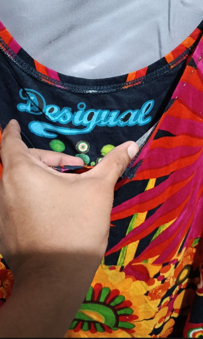 Desigual (Category: Activewear) located in Mandaluyong City. Submitted by newdepot (Listing ID 1465706677, Image 3). Description: Desigual Railey dress featuring a striking yellow and green mandala sunburst pattern on the front. size large no issue good condition.