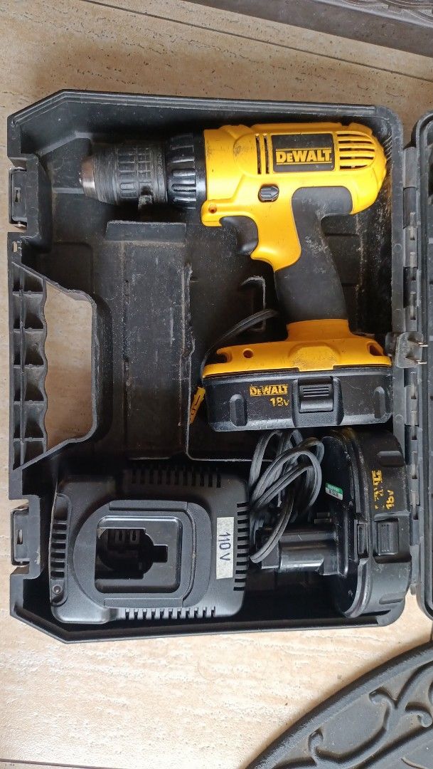 DeWalt DC970 18V Cordless Drill/Driver with Case and Charger (Category: Construction Tools & Equipment) located in Marikina City. Submitted by fericm (Listing ID 1465600929, Image 1). Description: - Model: DeWalt DC970 18V 1/2-inch VSR Cordless Drill Driver - Performance: Dual speed settings (0-450 and 0-1500 RPM) - Included: Original black carrying case, battery charger 110V, and extra battery pack - Condition: Fully functional, shows normal sig