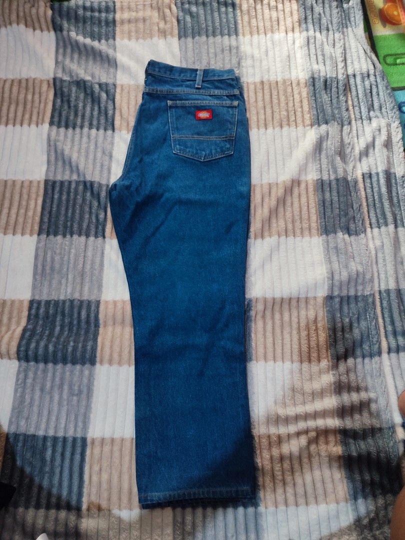 Dickies Denim Jeans Blue (Category: Jeans) located in Manila. Submitted by mommyregsthriftclothes (Listing ID 1465690242, Image 2). Description: - Brand: Dickies - Color: Classic Blue - Fit: Regular fit - Details: Sturdy belt loops, iconic red logo patch on back pocket, classic contrast stitching - Style: Durable everyday workwear - Sizing: Exact measurements shown in photos with tape measure.