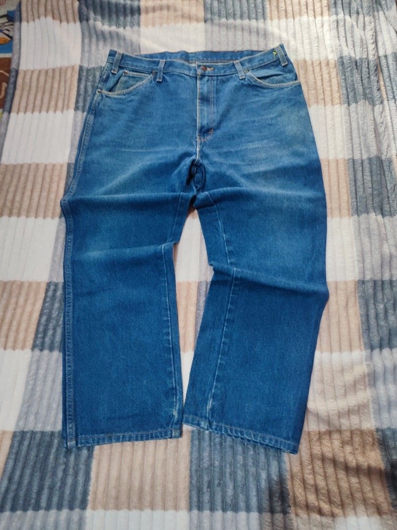 Dickies Denim Jeans Blue (Category: Jeans) located in Manila. Submitted by mommyregsthriftclothes (Listing ID 1465690242, Image 3). Description: - Brand: Dickies - Color: Classic Blue - Fit: Regular fit - Details: Sturdy belt loops, iconic red logo patch on back pocket, classic contrast stitching - Style: Durable everyday workwear - Sizing: Exact measurements shown in photos with tape measure.