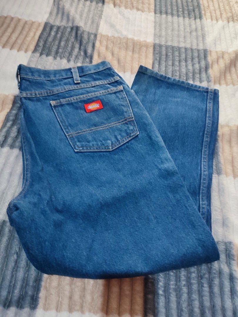 Dickies Denim Jeans Blue (Category: Jeans) located in Manila. Submitted by mommyregsthriftclothes (Listing ID 1465690242, Image 1). Description: - Brand: Dickies - Color: Classic Blue - Fit: Regular fit - Details: Sturdy belt loops, iconic red logo patch on back pocket, classic contrast stitching - Style: Durable everyday workwear - Sizing: Exact measurements shown in photos with tape measure.